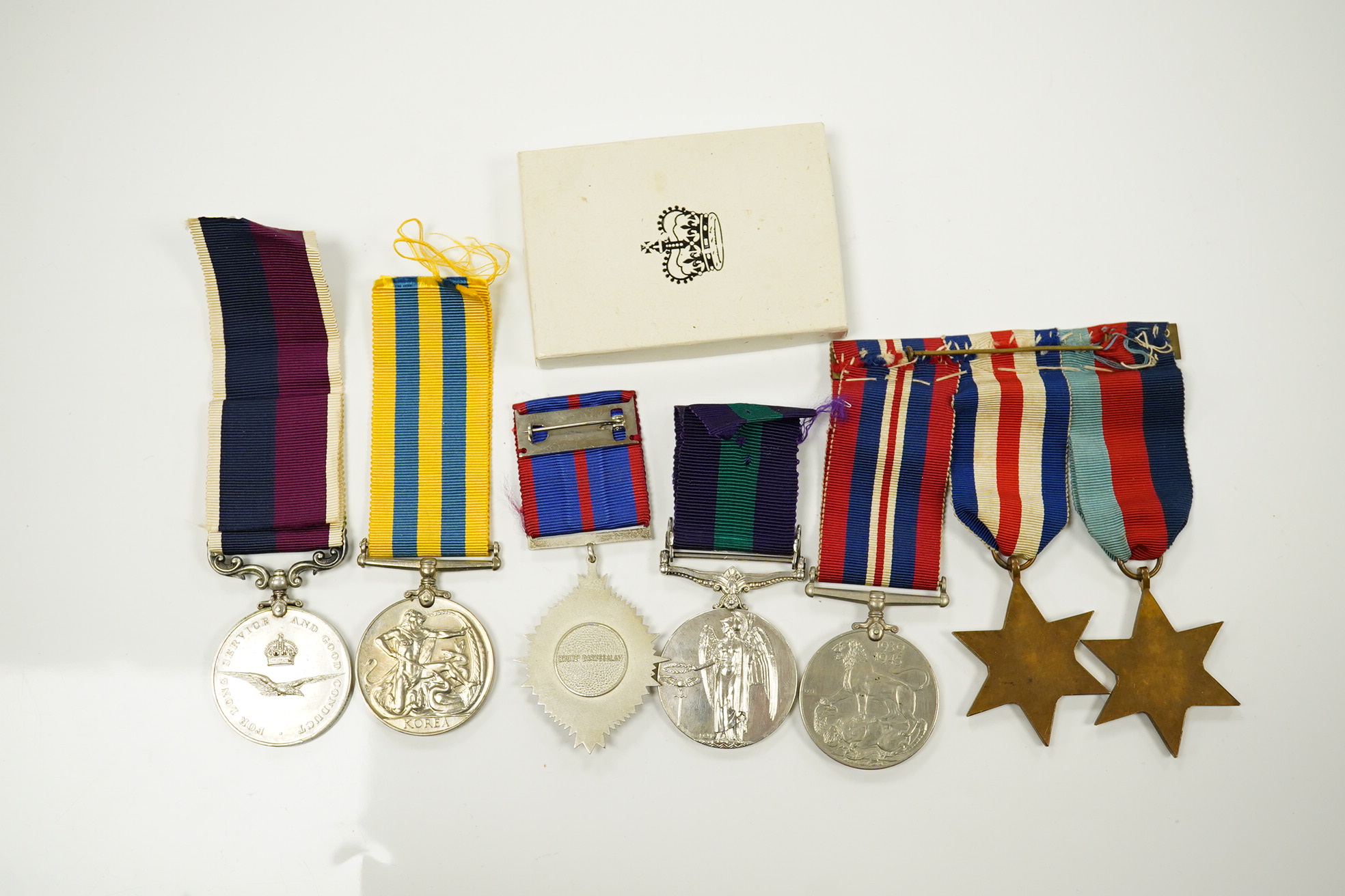 Seven military medals, including; a WWII medal group including the 1939-1945 Star, the France and Germany Star and the 1939-1945 Medal, a George V General Service Medal with a bar for Iraq awarded to GNR. G. Fuller R.A.